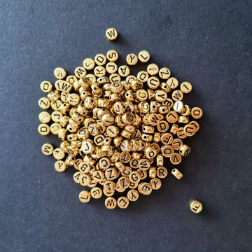 Alphabet Beads: Golden and black abc Round 20g