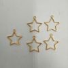 Picture of Golden Hollow Bezels Stars- Set of 10